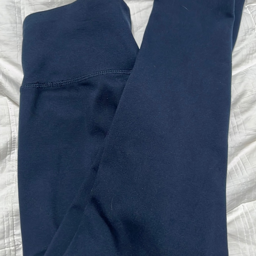 Dont know the brand 😬. Size Small. Navy blue